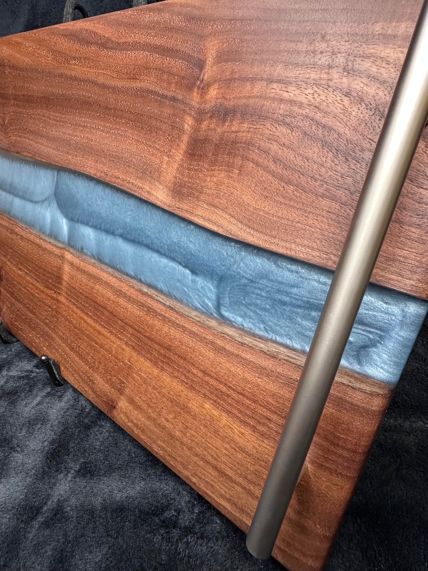 107 - Black Walnut with Silver Blue Epoxy River and Brushed Stainless Handles Charcuterie Board