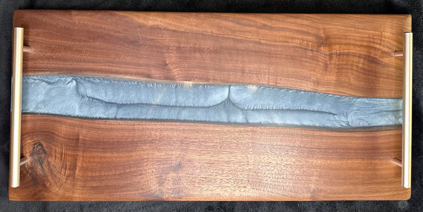 107 - Black Walnut with Silver Blue Epoxy River and Brushed Stainless Handles Charcuterie Board